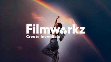 A Person Stands And Raises One Arm Against The Backdrop Of A Blue Sky With A Double Rainbow. The Text In Bold White Letters Reads &Quot;Filmworkz Phoenix,&Quot; With The Subtitle &Quot;Create Incredible&Quot; Below It.